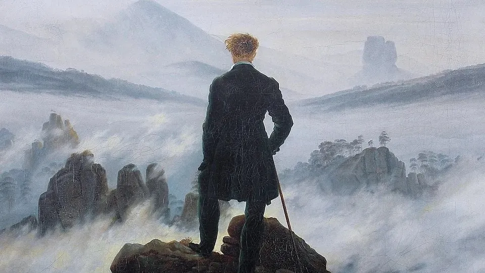 Oil painting of a man in a dark coat, seen from behind with his hair windswept, standing on a rocky crag with a walking stick and looking out over a sea of fog, with rock pinnacles and distant mountains rising through it.